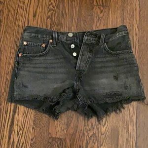 Free People black distressed jean shorts